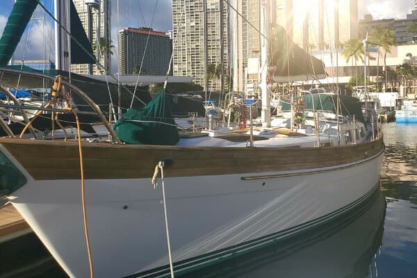Sailing yacht moored in Honolulu at golden hour